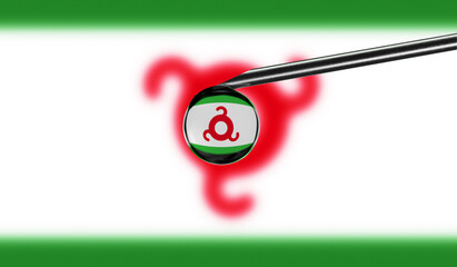 Vaccine syringe with drop on needle against national flag of Ingushetia background. Medical concept vaccination. Coronavirus Sars-Cov-2 pandemic protection. National safety idea.