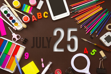 July 25th. Day 25 of month, Calendar date. School notebook and various stationery with calendar day. School and office supplies frame. Summer month, day of the year concept.