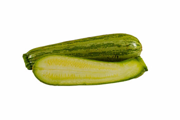 Italian zucchini cut in half isolated on white background in closeup