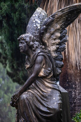 Fototapeta premium sculptural ensemble of the parthenon owned by the Darder Ferrer, black angel, Soller cemetery, Mallorca, Balearic Islands, Spain