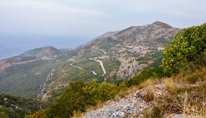 Highway in the mountains. View from the road to the tops of the mountains. High in the mountains. Montenegro