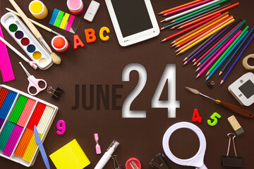 June 24th. Day 24 of month, Calendar date. School notebook and various stationery with calendar day. School and office supplies frame. Summer month, day of the year concept.