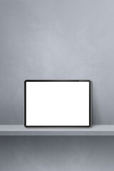 Digital tablet pc on grey wall shelf. Vertical background banner