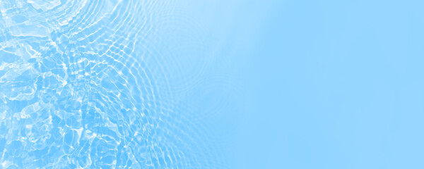 Fresh water background. Bright blue pattern with natural rippled water texture. Web banner with...