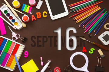 September 16th. Day 16 of month, Calendar date. School notebook and various stationery with calendar day. School and office supplies frame. Autumn month, day of the year concept.