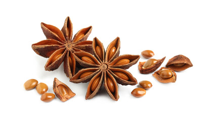 Dry anise stars with seeds on white background