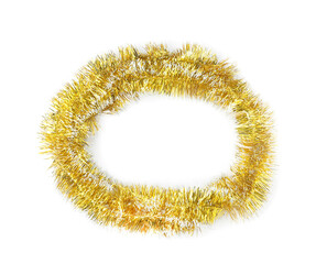 Obraz premium Shiny golden tinsel isolated on white, top view
