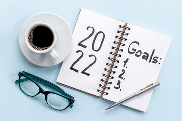 Goals New Year Resolutions concept - word on notebook, top view