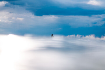 Dreamy Shot Of Surfer Waiting For Wave