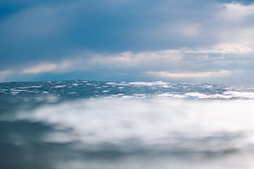 Sky Reflections On Sea Water Surface