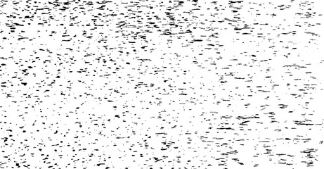 Small uneven spots and particles of debris. Abstract vector texture. Distressed uneven background. Grunge texture overlay with fine grains isolated on white background. Vector illustration. EPS10.