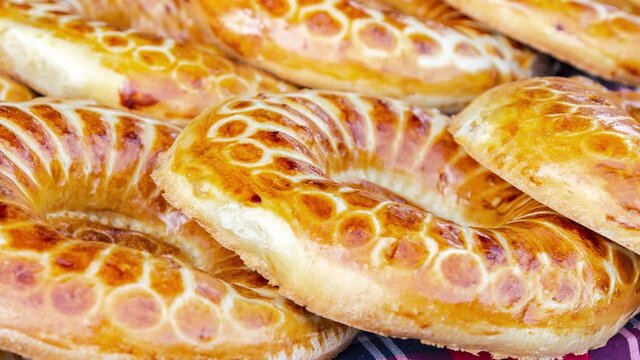 Appetizing uzbek flatbreads with sesame seeds from the tandir (Lavash)