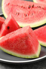 Delicious fresh watermelon slices on plate, closeup