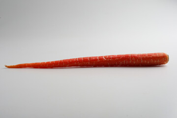 Fresh red carrot on white background