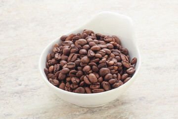 Roasted coffee bean in the bowl