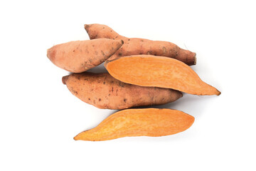 Cut and whole sweet potatoes on white background, top view