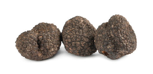 Fresh whole black truffles isolated on white