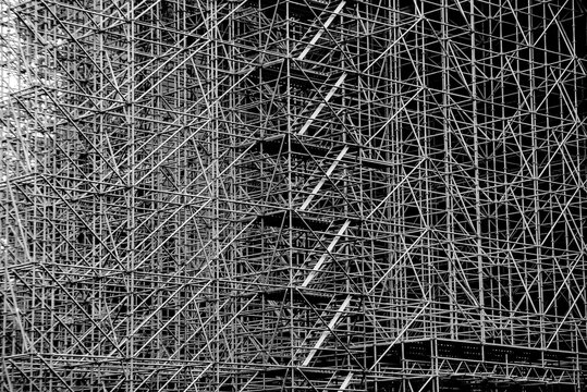 metal scaffolding for large construction work forming an industrial texture