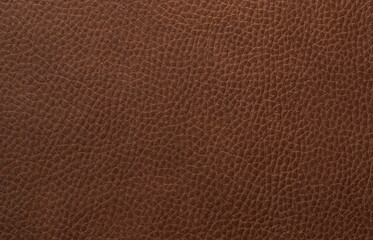 brown artificial leather with waves and folds on PVC base
