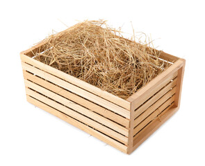 Dried hay in wooden crate on white background © New Africa