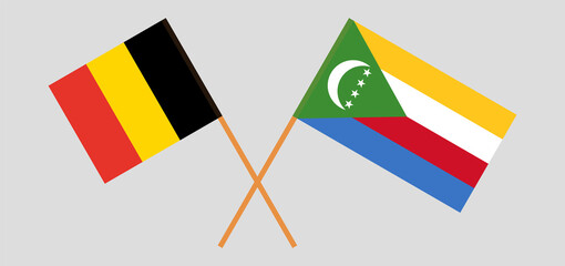 Crossed flags of Belgium and the Comoros. Official colors. Correct proportion