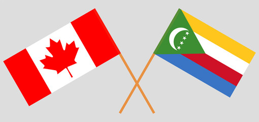 Crossed flags of Canada and the Comoros. Official colors. Correct proportion