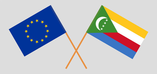 Crossed flags of the European Union and the Comoros. Official colors. Correct proportion