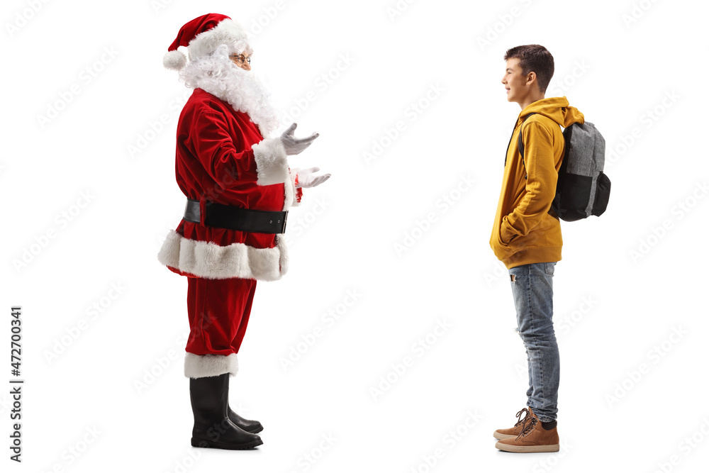 Sticker santa claus standing and talking to a male teenage student