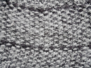 Texture of black white fabric, close up of wool structure, wallpaper background.