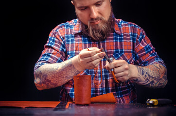 Leather master producing leather goods