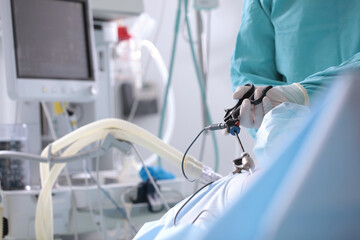 Laparoscopic surgery. Medical instruments in the hands of doctors. Modern medical equipment....