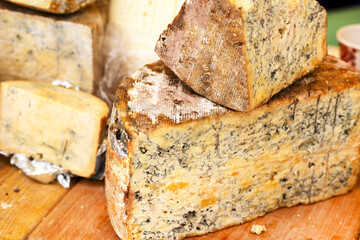 Blue mold cheese. Collection of cheese on wooden board.