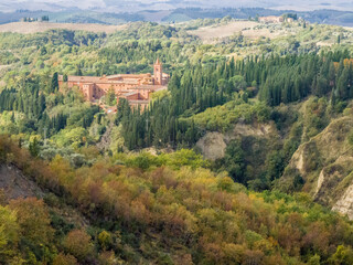 Italy, Tuscany. The abbey of Monte Oliveto Maggiore, a large Benedictine monastery located in Tuscany.