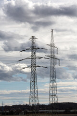 High-voltage power lines electricity transmission pylon  