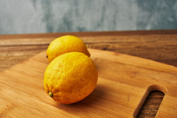 yellow lemon cutting board kitchen fresh food