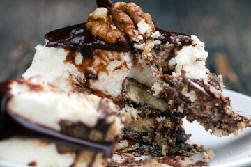 chocolate cream cake covered with milk chocolate