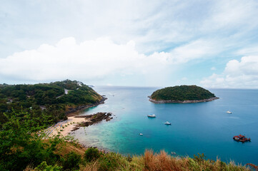 Naklejka premium Beautiful landscape with ocean shore, small green island. Phuket, Thailand.