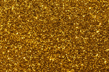 Golden yellow brown glitter bokeh background. Photo can be used for New Year, Christmas and all celebration concepts.	
