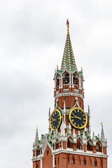 Obraz premium Kremlin tower against heavy gray clouds. Moscow, Russia.