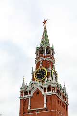 Kremlin tower against heavy gray clouds. Moscow, Russia.