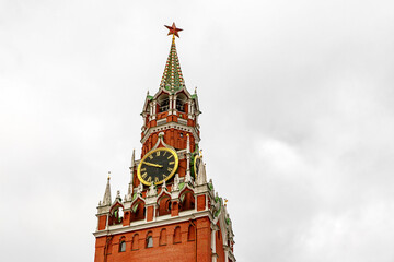 Kremlin tower on rainy clouds background.