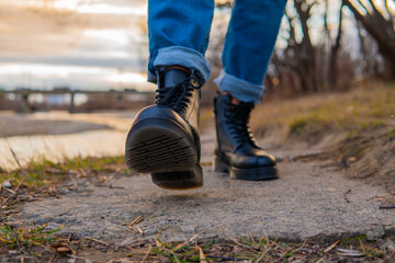 men's feet in winter leather boots