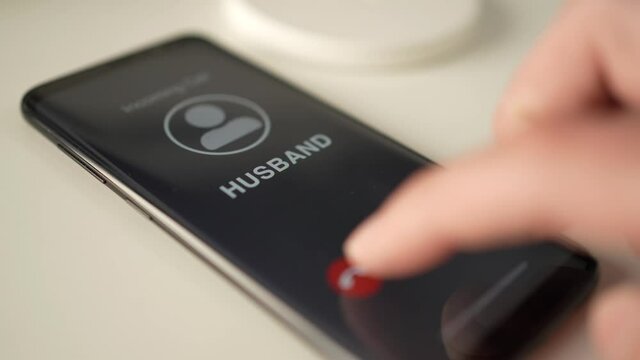 Mobile Phone Receiving Incoming Call from Husband and Then Declining