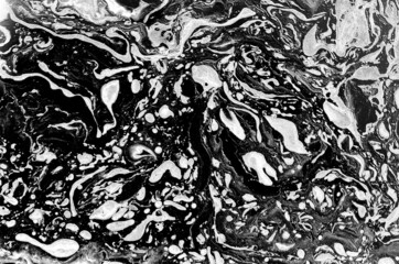 Black and white abstract painted background, wallpaper, texture. Modern art.