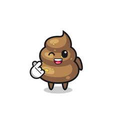 poop character doing Korean finger heart