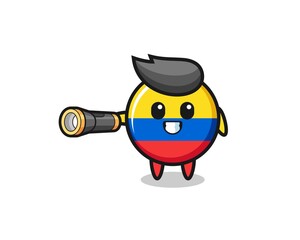 Fototapeta premium colombia flag mascot holding flashlight