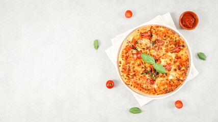Round baked pizza in a plate with white kitchen napkin