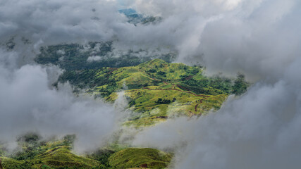 Landscape peeping though the clouds 