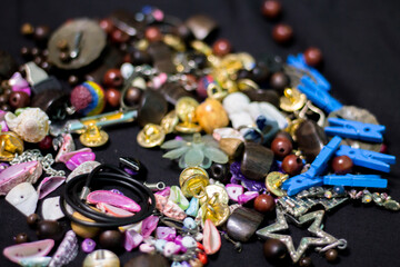 different beads and small things. Hobby items. creative mess.