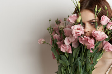 cheerful woman flowers in hands posing charm isolated background